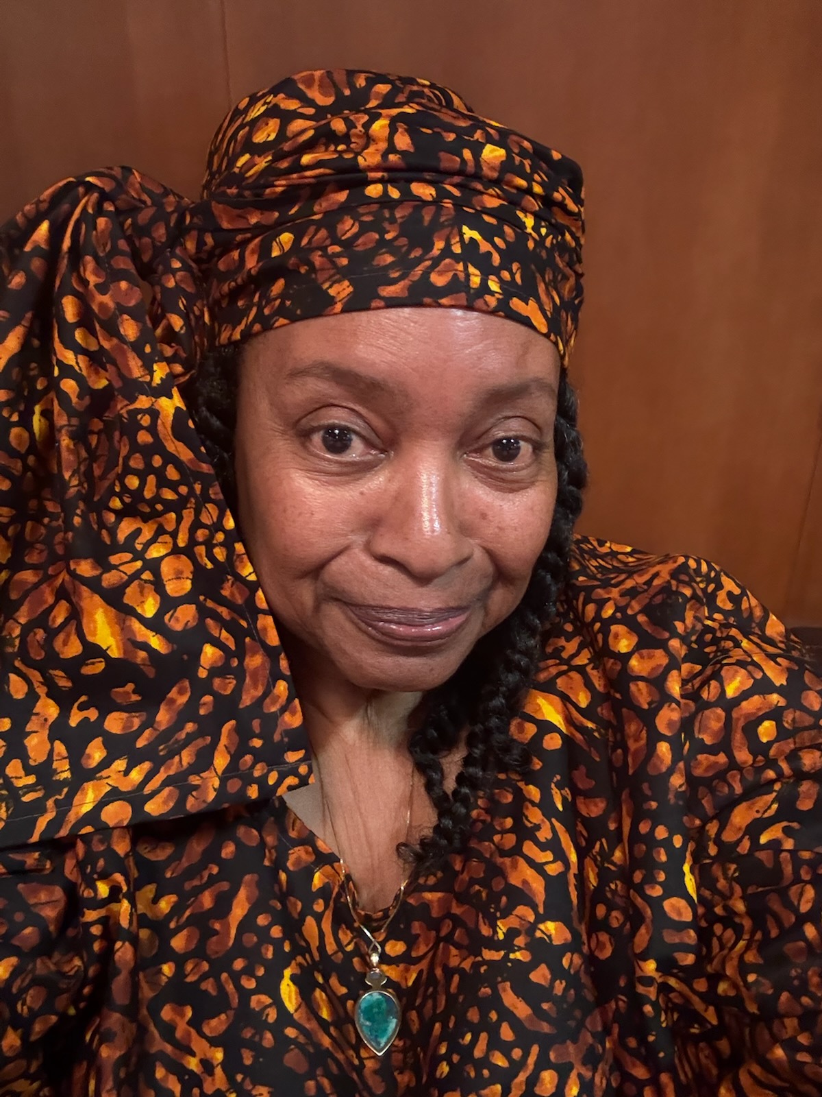Joi Milhous wearing an African-print ensemble.